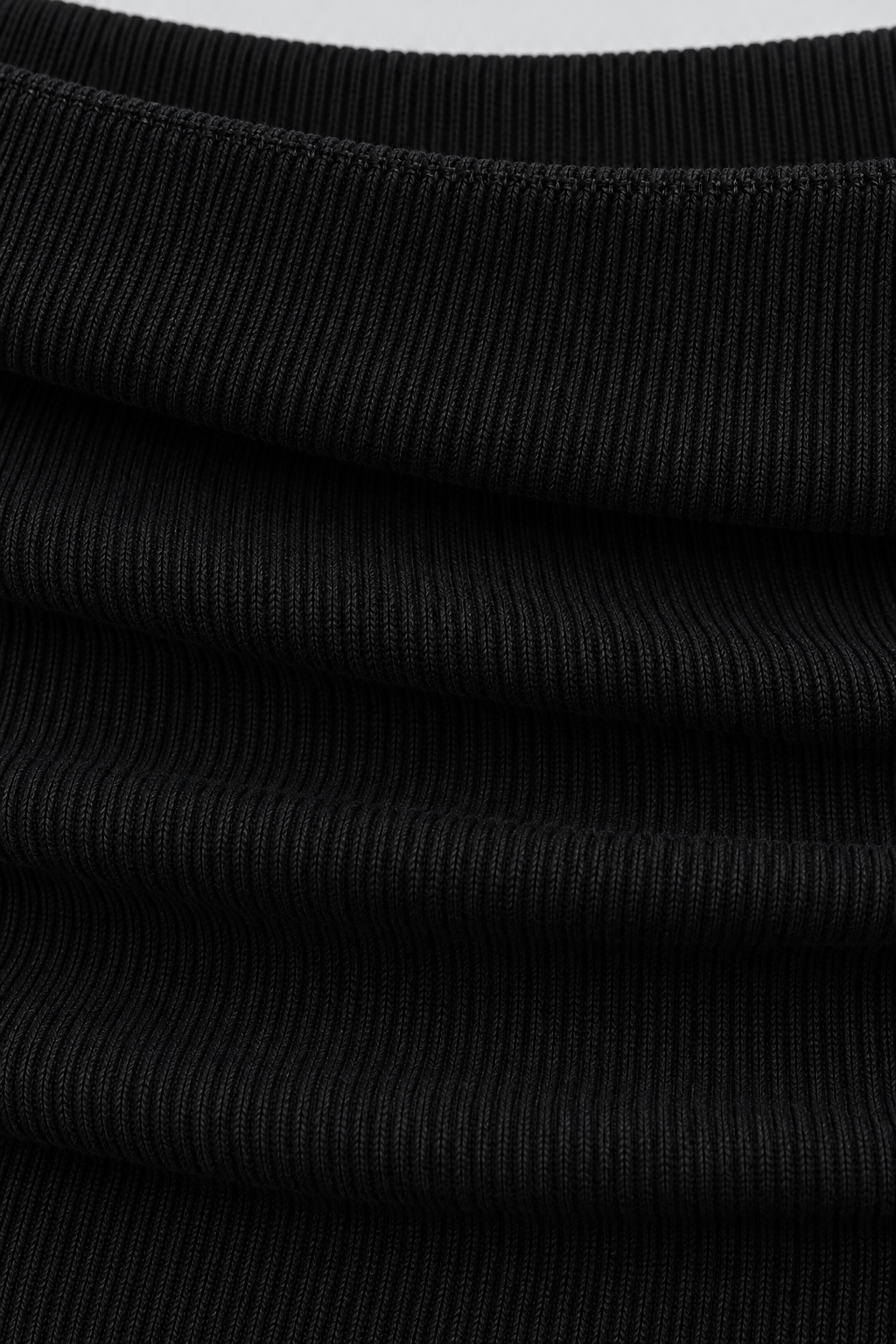 Jersey de punto con hombros descubiertos — detalle de punto