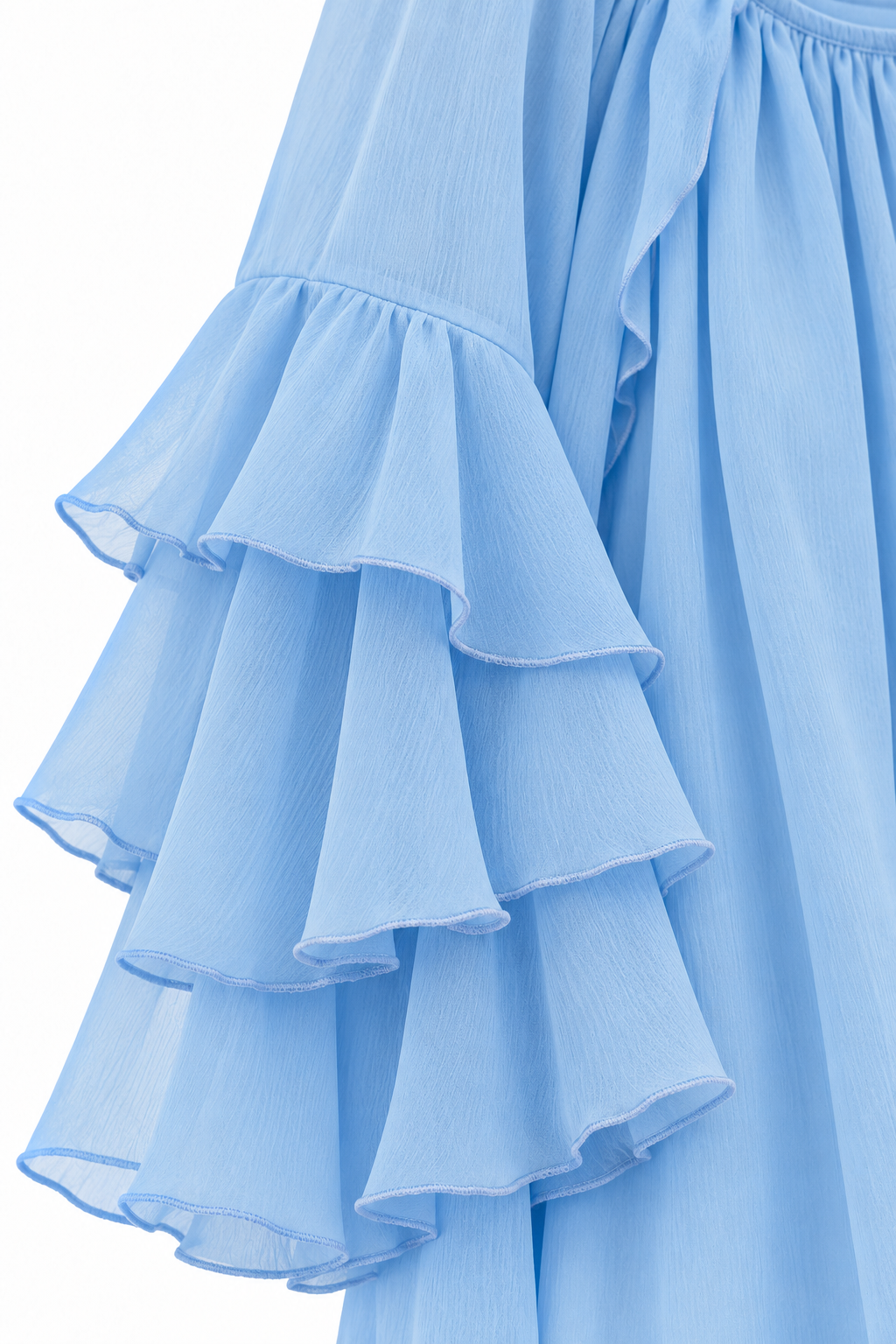 Anna Verona — blusa-volantes-azul, detalle de confección