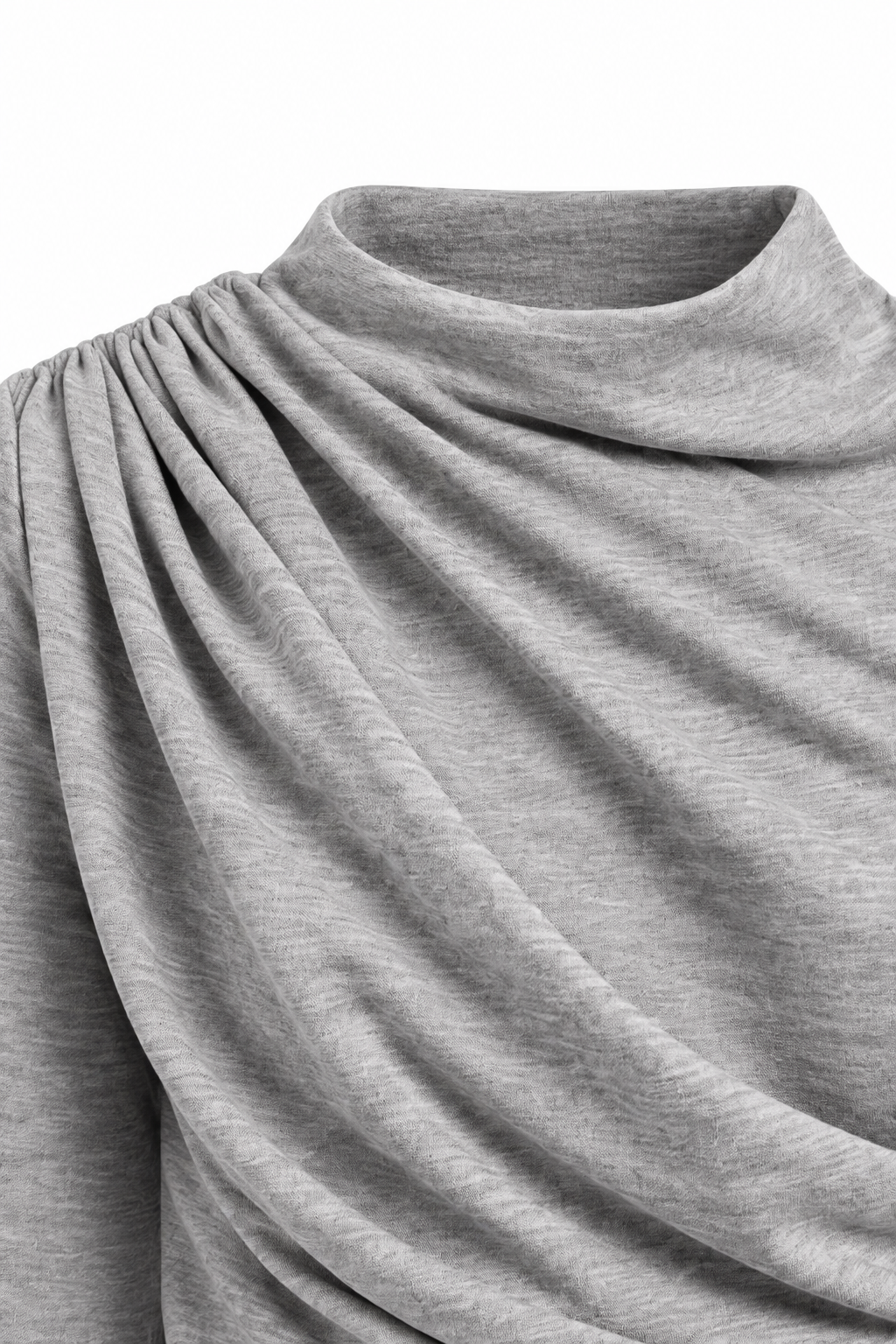 Detalle del cuello drapeado, el fruncido al hombro y el punto gris jaspeado