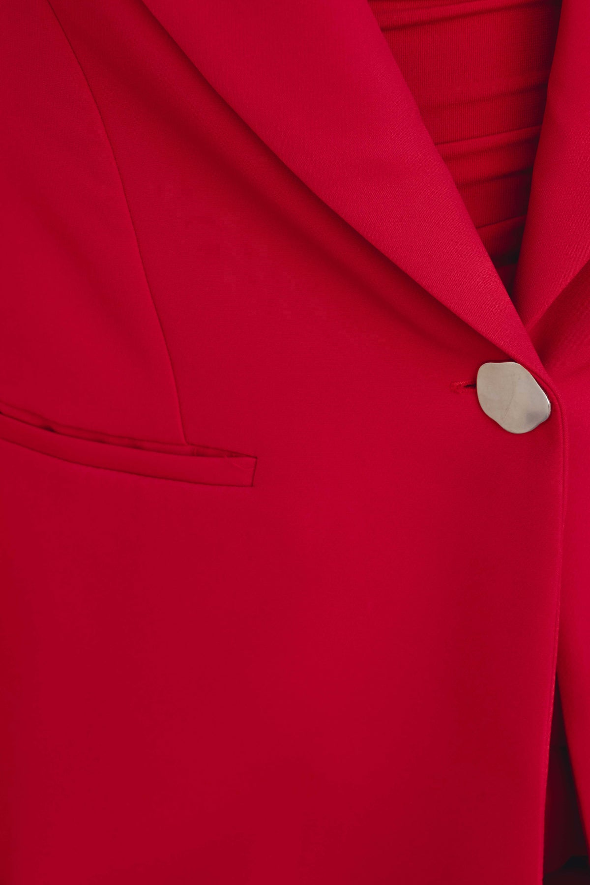 Blazer Costanza con botón plateado